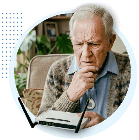 Elderly man holding a router thinking if he needs broadband for a digital home phone (VoIP)?