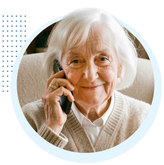 Elderly woman with gray hair making a call and looking happy.